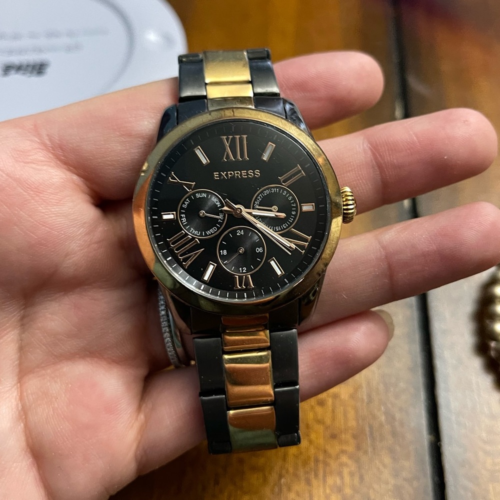 Black and gold watch
